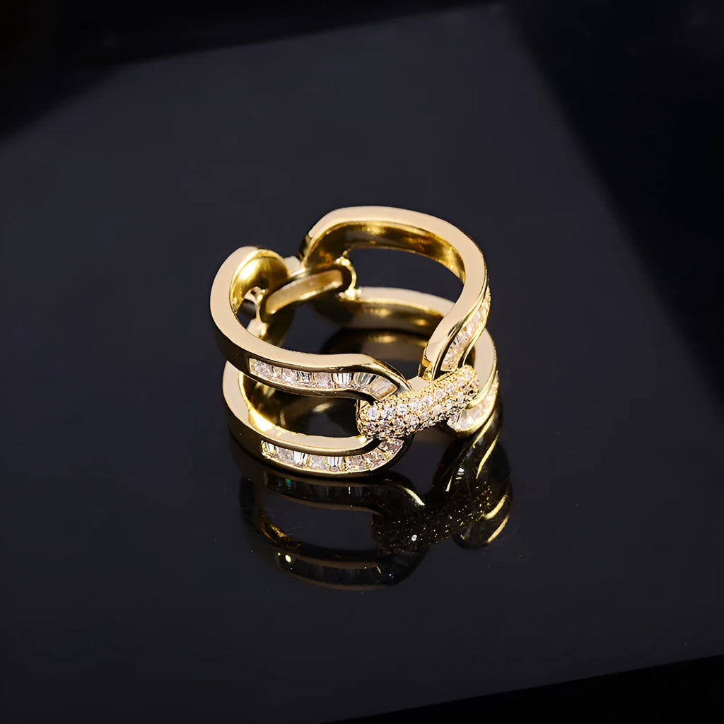 Gold electroplated copper round scarf ring with geometric shape on a silk scarf