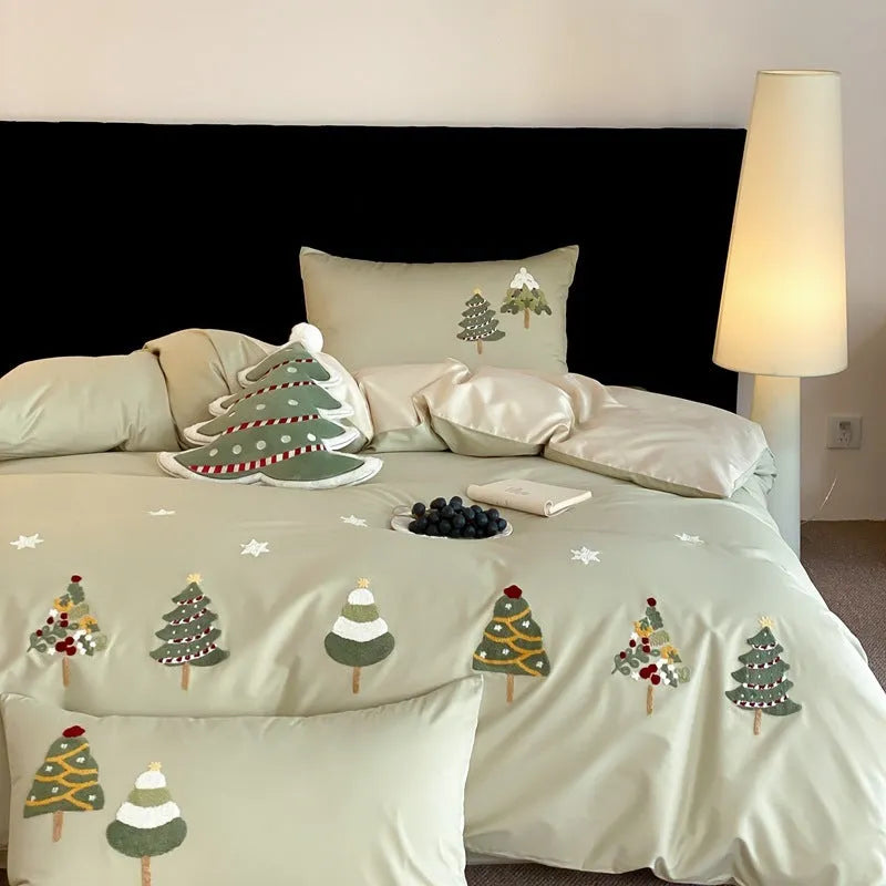 Cream blue duvet cover with embroidered Christmas tree and towel pattern, part of a pure cotton four-piece bedding set.