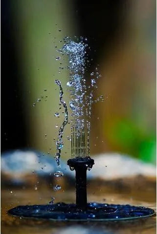 Black solar-powered water fountain pump with four spray nozzles for garden ponds