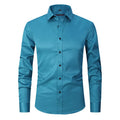 Man wearing a stretch polyester long sleeve work shirt in a blue colour, suitable for manual labour.