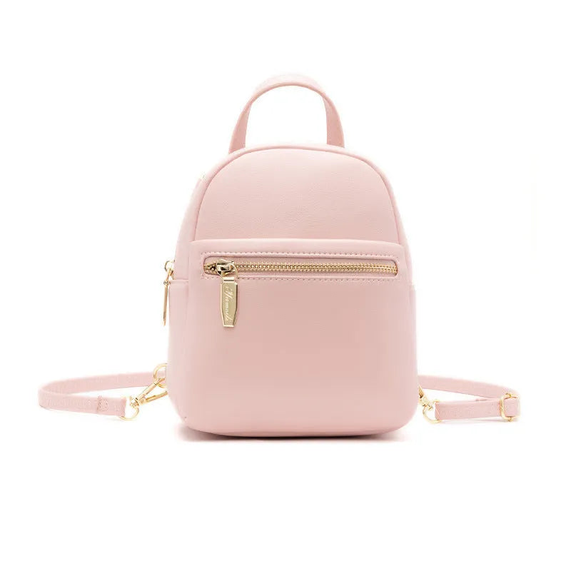 Soft PU mini backpack in street style, shown open to reveal internal phone pocket and zipper bag.
