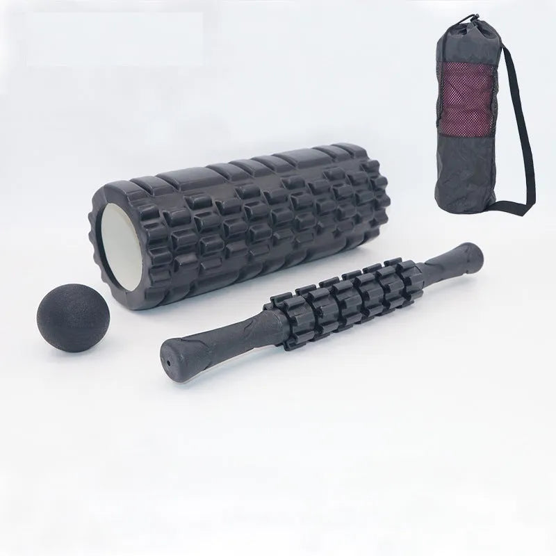 Black six-piece foam massage roller stick with gear design, 33cm long.