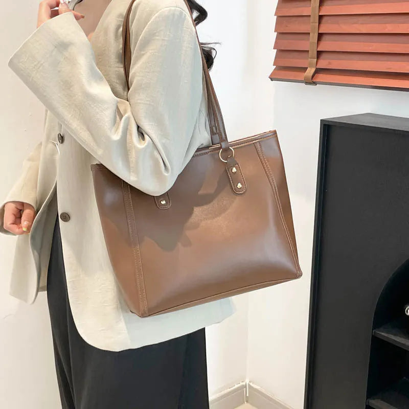 Korean style horizontal square shoulder bag with sandwich pocket detailing in four colour options