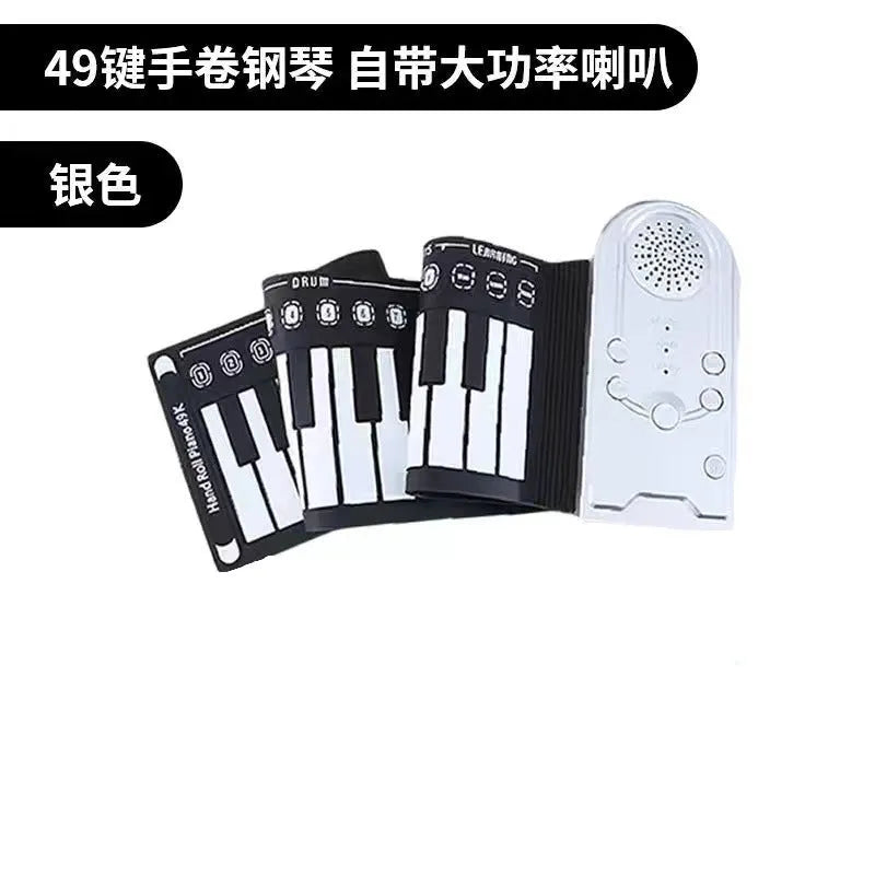 Pearl white portable electronic keyboard with rolled-out silicone keys and compact ABS plastic control panel.