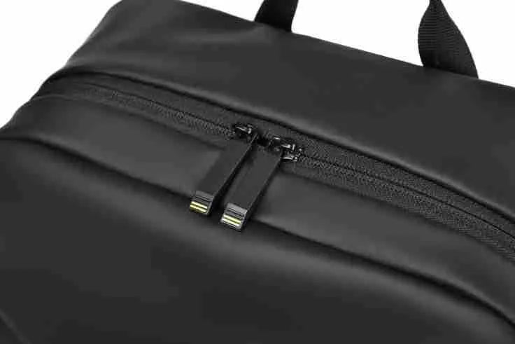 Large capacity waterproof PU leather backpack in black colour with sewing thread detailing