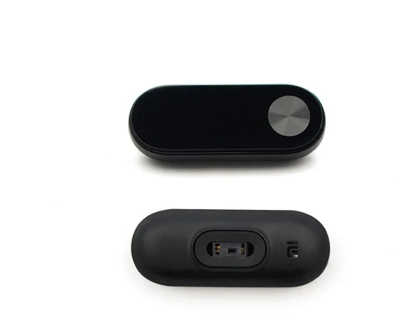 Xiaomi Mi Band 2 black fitness tracker with OLED screen on a wrist.
