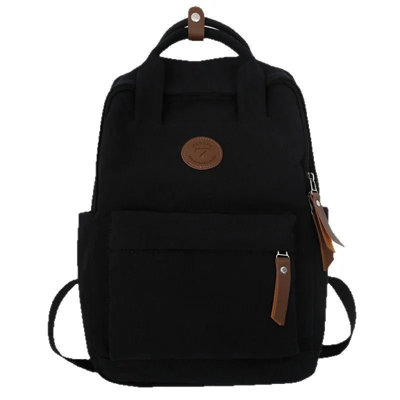 Black Oxford cloth leisure travel backpack with curved shoulder straps