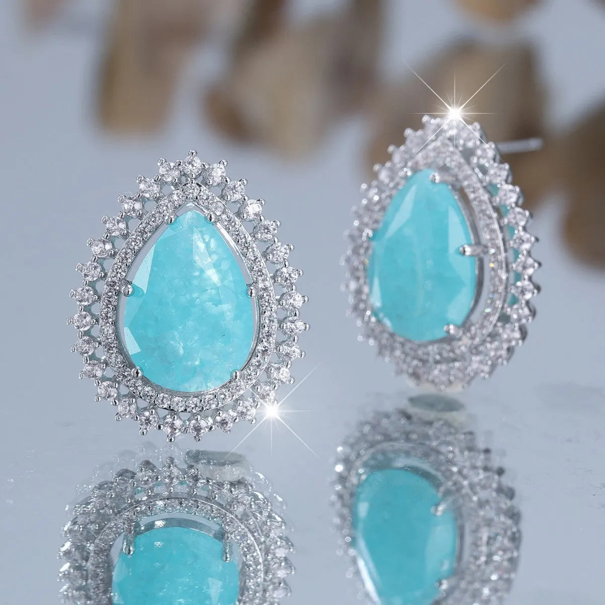 Women's platinum-coloured water drop earrings with heart-shaped ice flower diamond design elements
