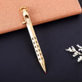 Brass hexagonal bolt-action pen showing six-angle design and bolt mechanism