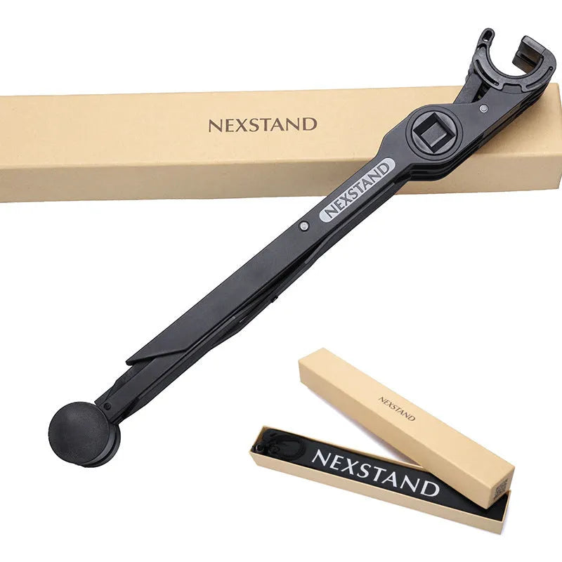 Black foldable enhanced nylon laptop stand shown open next to its portable carry bag.