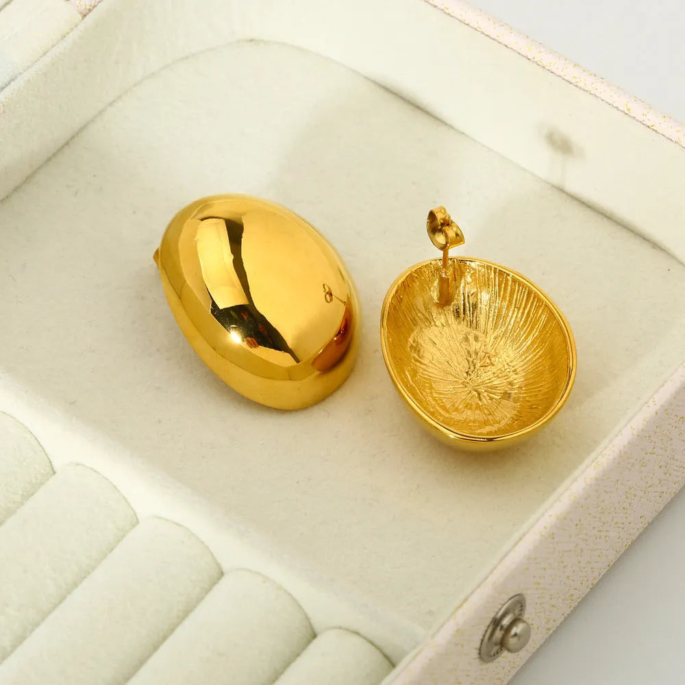 Geometric stainless steel ear studs with a glossy 18K gold tone electroplated finish