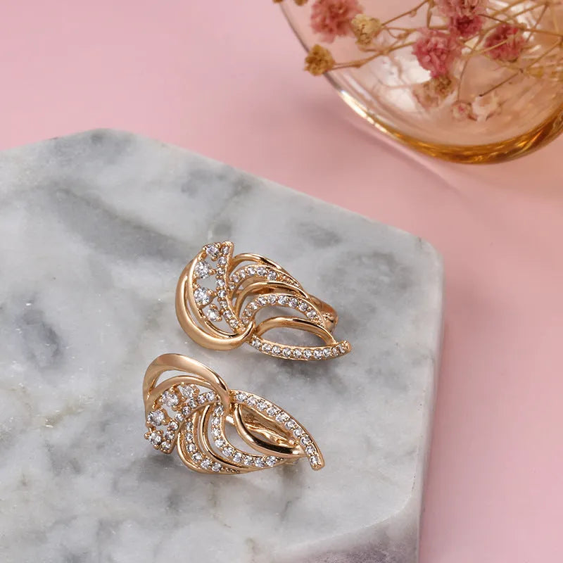 Women's gold-plated ear clips with wings design and micro-inlaid zircon stones in colour H0195