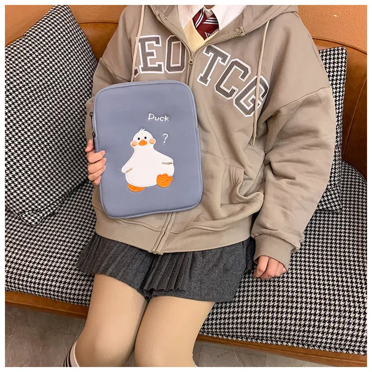 Blue cotton tablet case with duck embroidery, zipper closure, and 11inch to 15to16inch size options