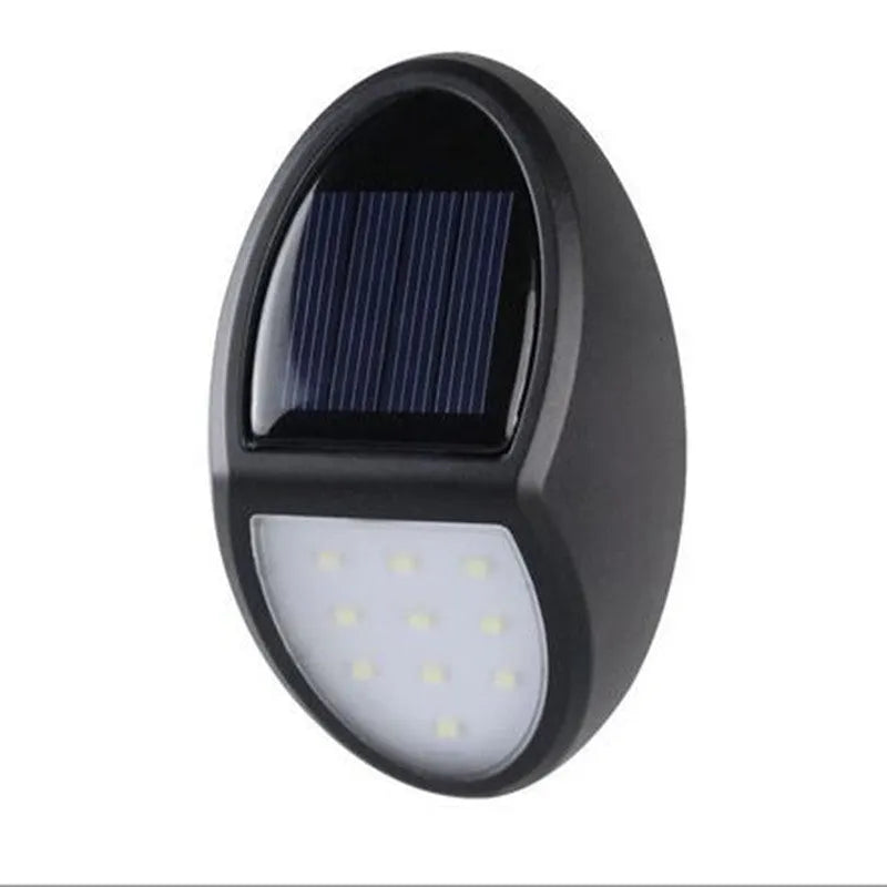 Black solar-powered LED wall light with automatic light sensor for outdoor use