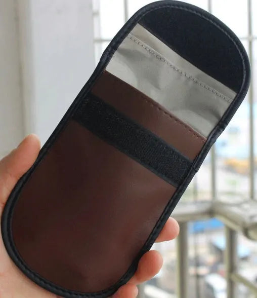 Black microfiber RFID blocking bag for car keys and credit cards, measuring 13.5 by 9.5 centimetres.