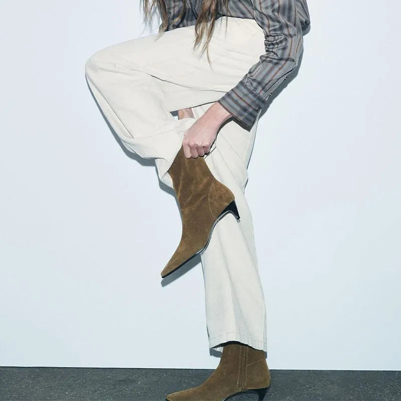 Brown square-toe mid-calf boots with a side zip and a stiletto kitten heel on a plain background.