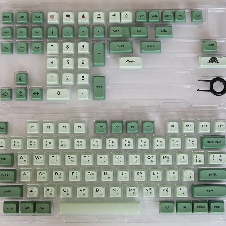 124 PBT dye-sublimation keycap set in matcha green colour on a keyboard.