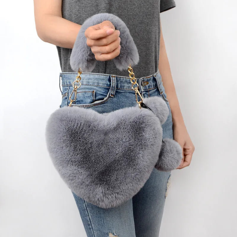 Heart-shaped soft plush women's handbag with zipper opening in medium size