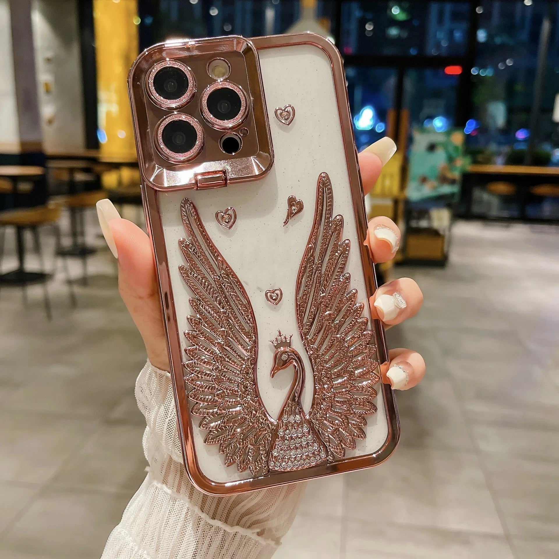 Angel wing frame bracket electroplated TPU phone case in transparent black for iPhone 15 Pro Max with built-in stand