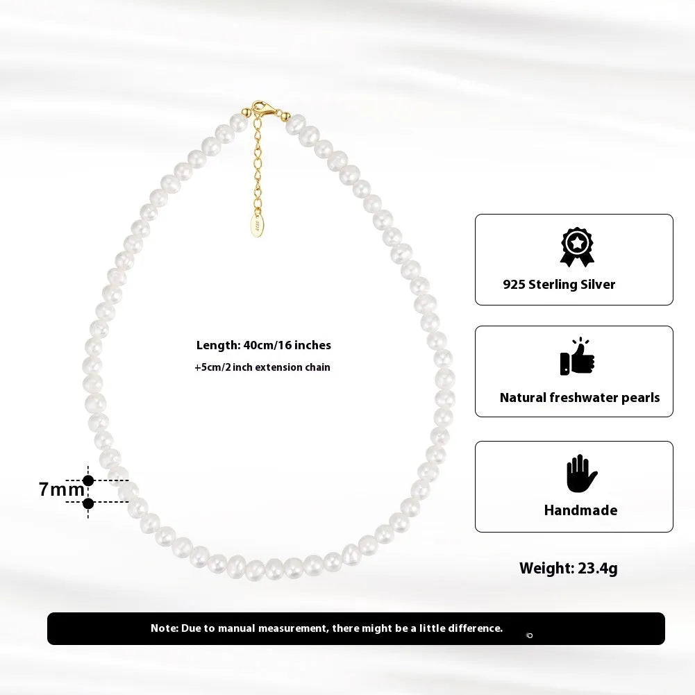 Women's adjustable sterling silver necklace with natural freshwater pearls.
