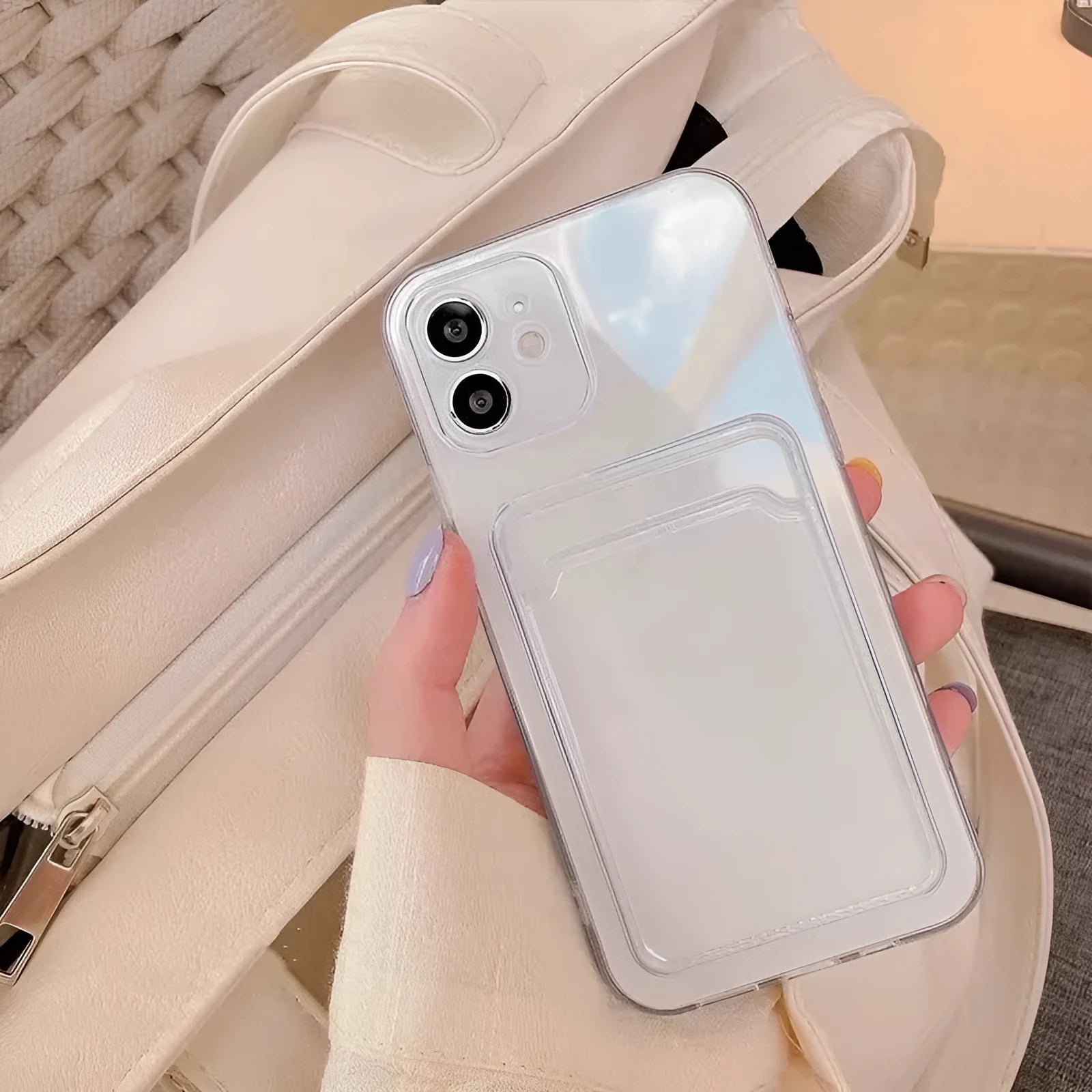 Transparent clear PVC iPhone case with card slots on back for Apple models.
