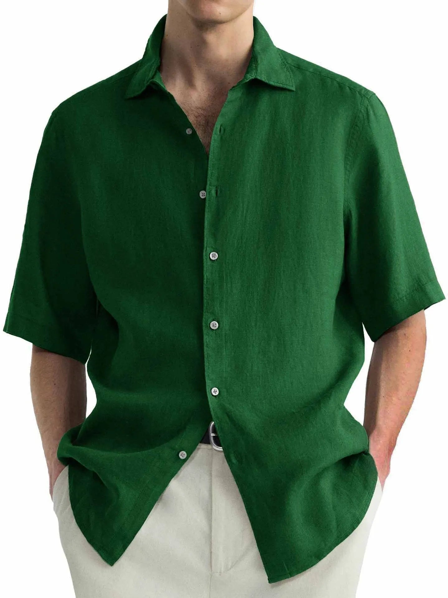 A man wearing a green washed cotton casual shirt in a cardigan style with a regular fit.