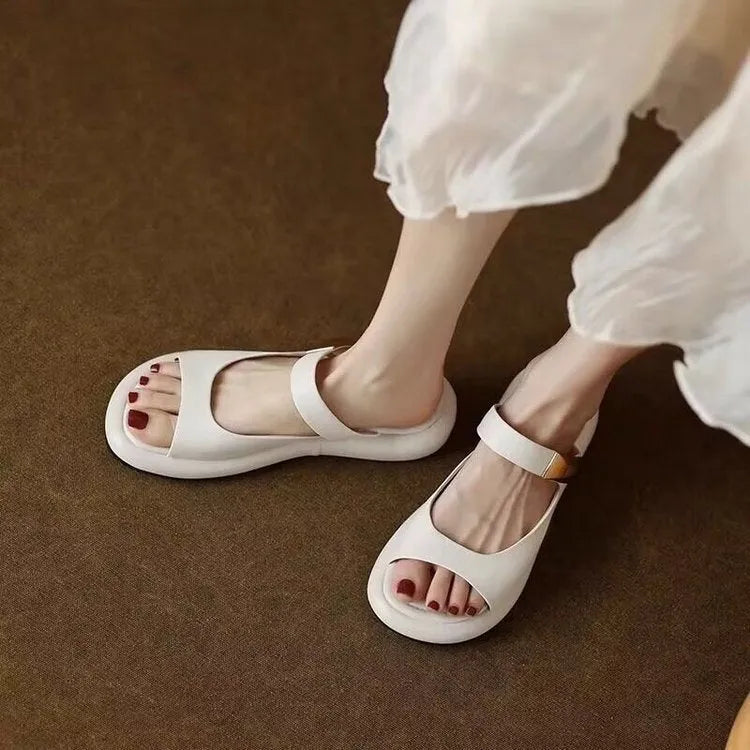 Apricot and white peep toe flat platform sandals with a rubber sole for outdoor casual wear.