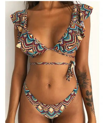 Yellow floral print split bikini swimsuit on a model