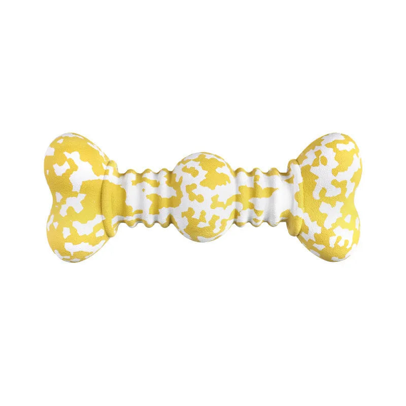 Green and white camouflage patterned natural rubber dog chew toy for large breeds on a wooden floor.