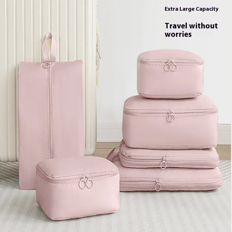 Travel buggy bag in memory cloth with polyester lining, six-piece compressed clothing set, 36-55L capacity, solid colour