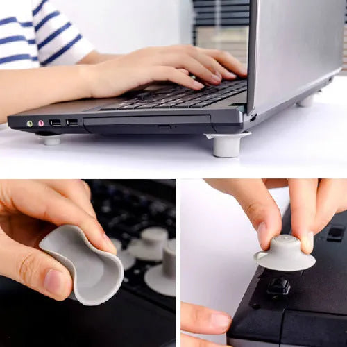 Four grey durable plastic laptop cooling pads, two large and two small, on a wooden desk.