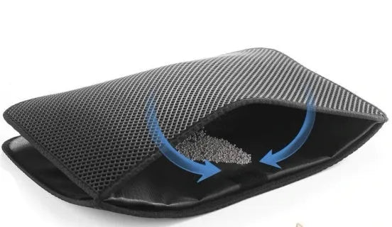 Waterproof EVA double-layer cat litter mat in black honeycomb design, size L foldable, placed under a litter box