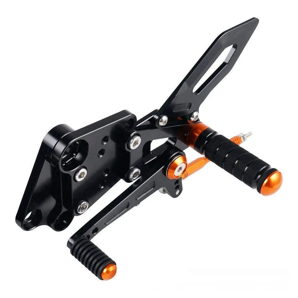 KTM DUKE motorcycle raised rear shift pedal support bracket assembly in black and orange
