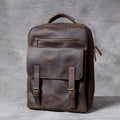 Dark coffee coloured handmade leather backpack with internal organiser compartments.