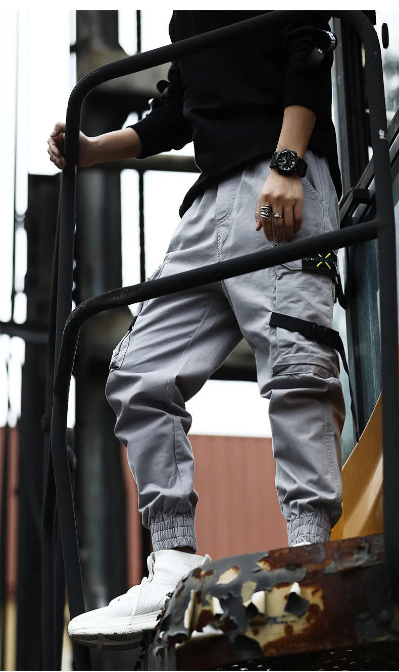Men's cotton cargo pants in Khaki with multiple pockets, side view