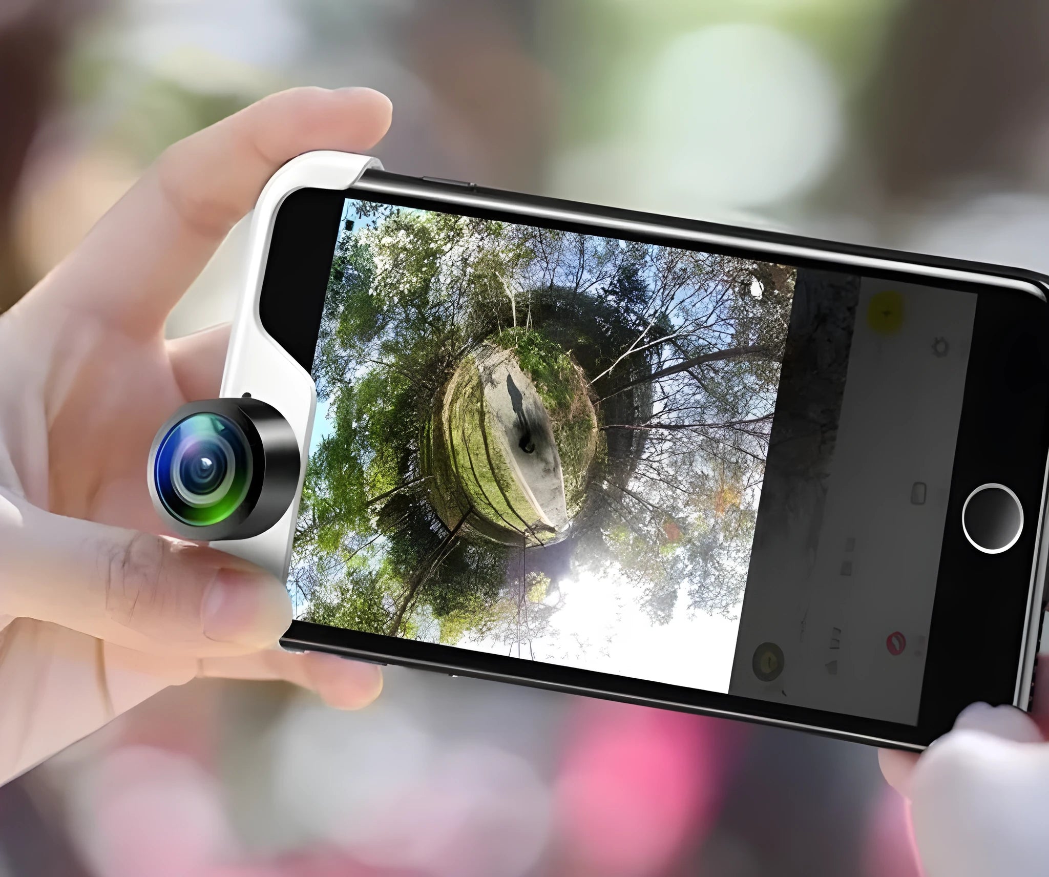Universal 360-degree panoramic camera lens attached to an Apple iPhone.