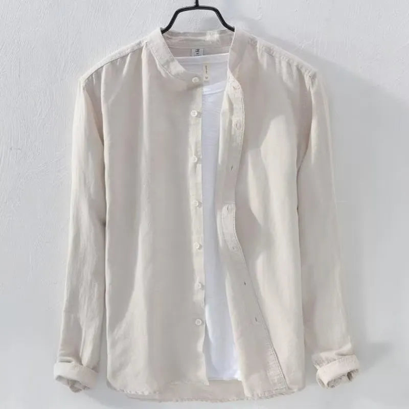 Man wearing a loose fit light blue linen cotton long sleeve casual shirt