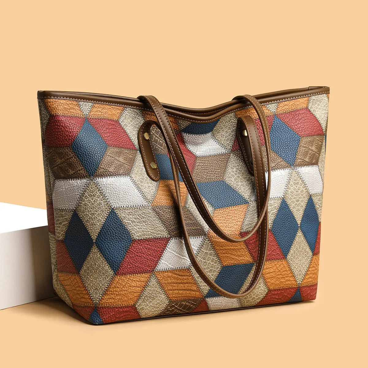 Women's PVC shoulder bag with sandwich pocket design in blue-brown colour