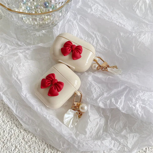 Beige red bow shell TPU clamshell case for AirPods Pro, AirPods 3, AirPods 1 and AirPods 2 wireless earphones