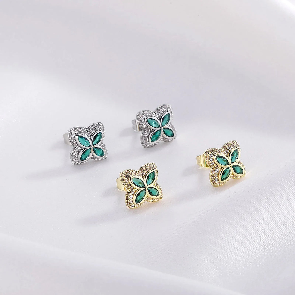 Four-leaf clover stud earrings with full diamond micro inlay, copper base, flower and leaf shape