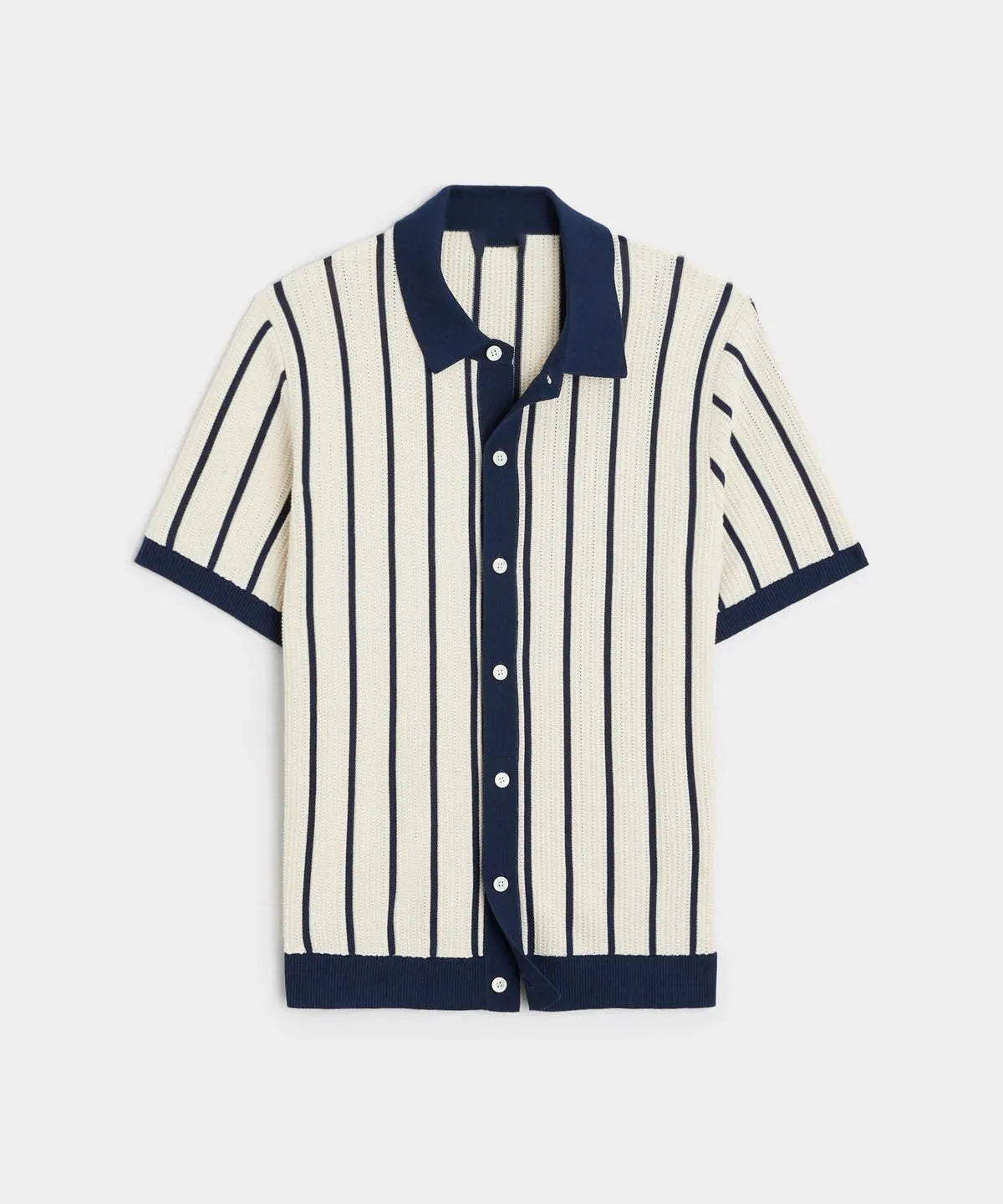 Men's white asymmetric lapel short sleeve knitted shirt laid flat.