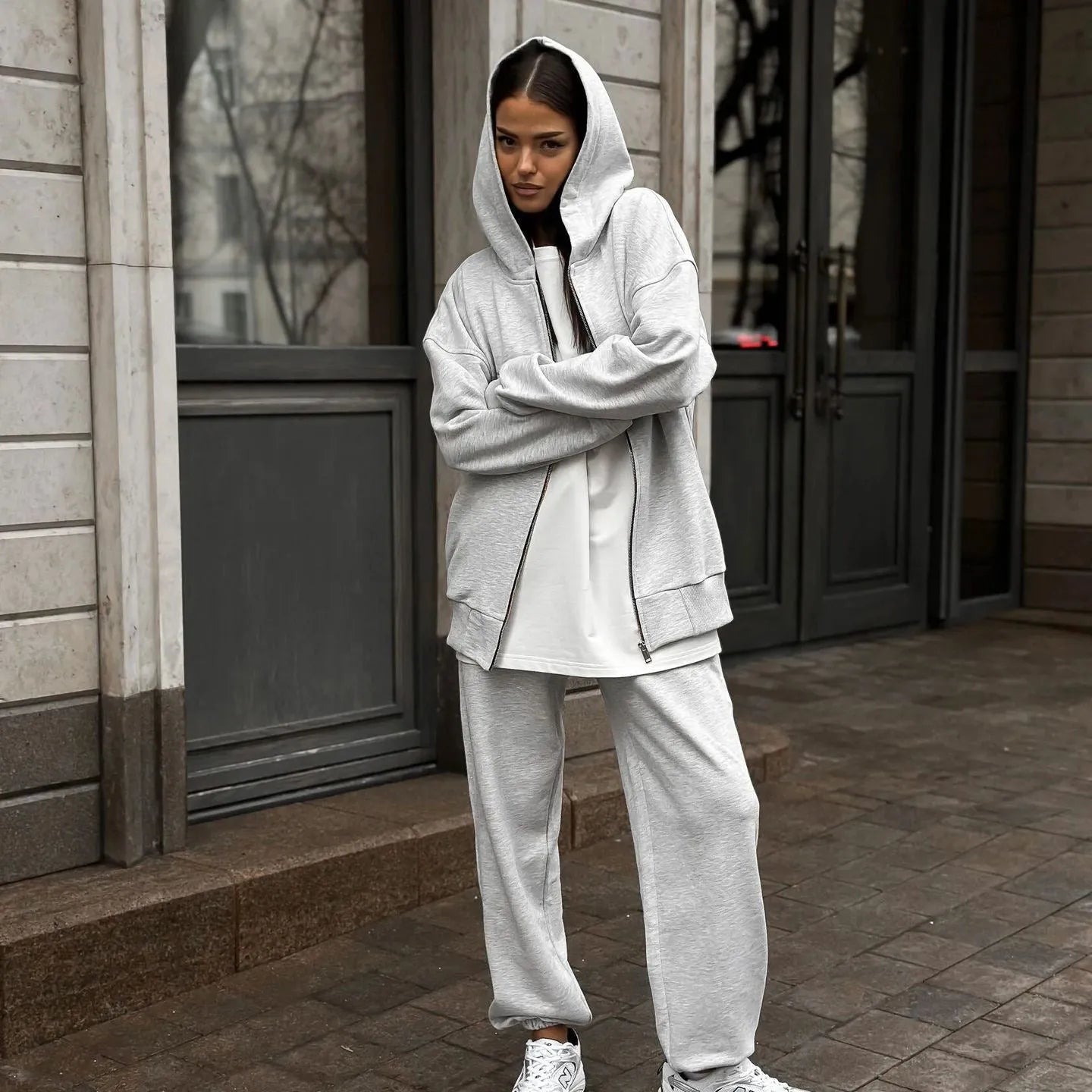 Women's loose fit street style two-piece set with long sleeve coat and trousers in solid colour