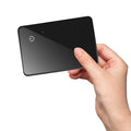 Black NFC pet tracking card with wireless charging, showing hanging hole and slim 2.1mm profile.