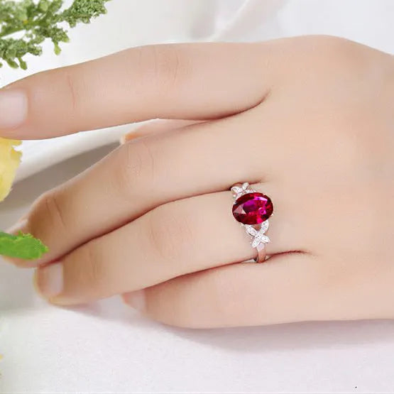 Women's butterfly ring with heart shape design in 18k rose gold plating with red enamel colour option