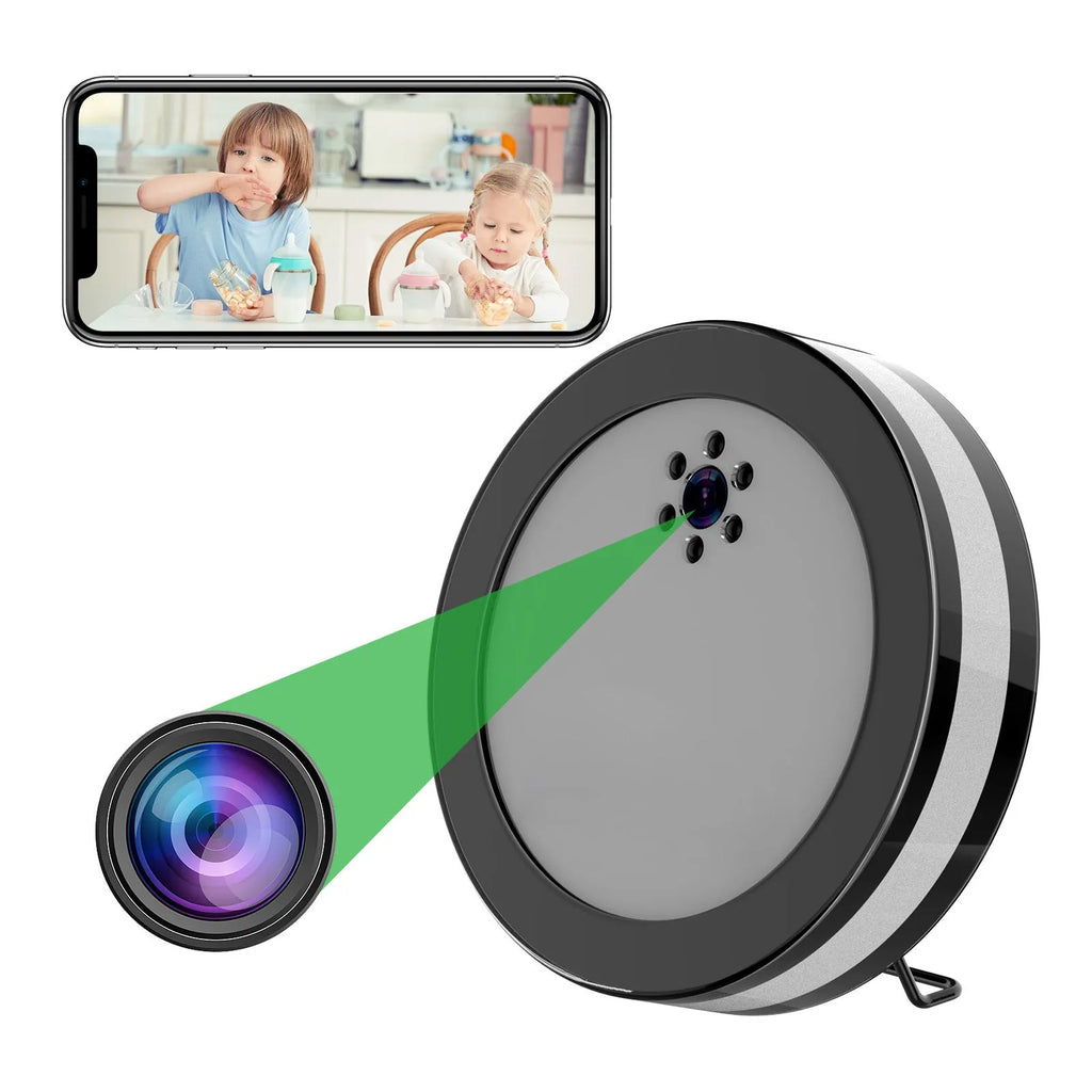Black wireless smart surveillance camera with night vision and voice conversation on a desk