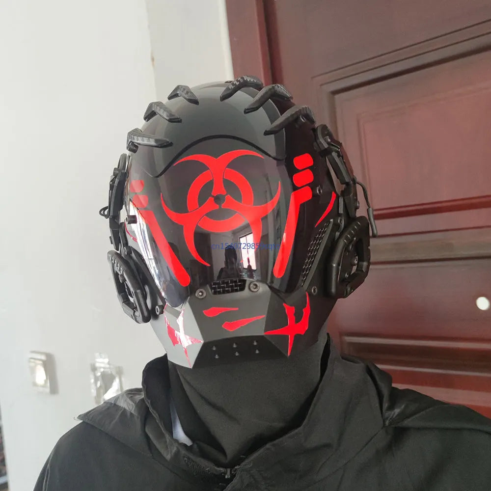 Black full-face bioweapon-style prop helmet with bio-mechanical details, shown from the front.