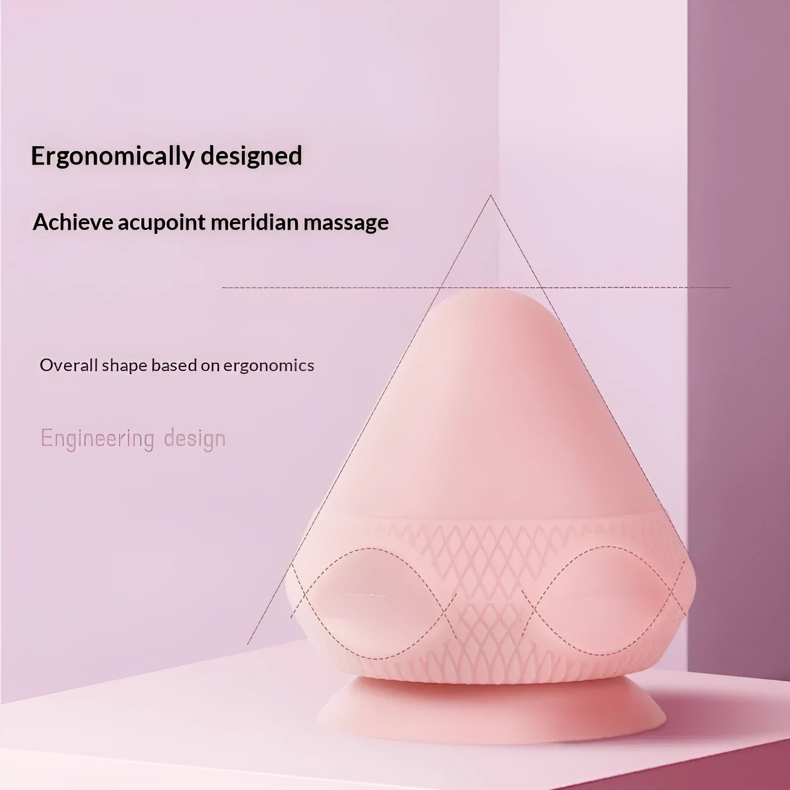 Fitness Meridian silicone massage ball 32x75mm in pink on a light surface