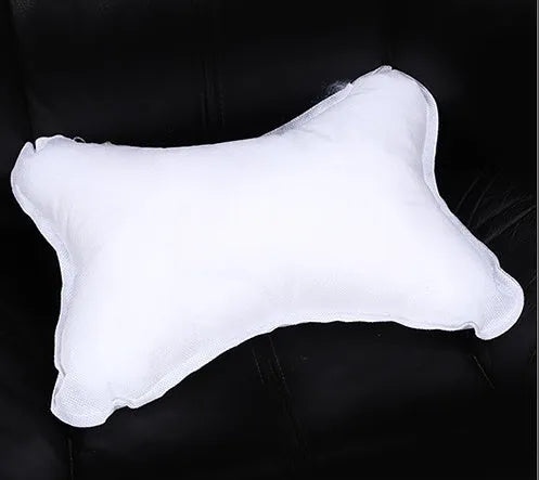 Car headrest neck pillow with green leather exterior available in black and red colour options