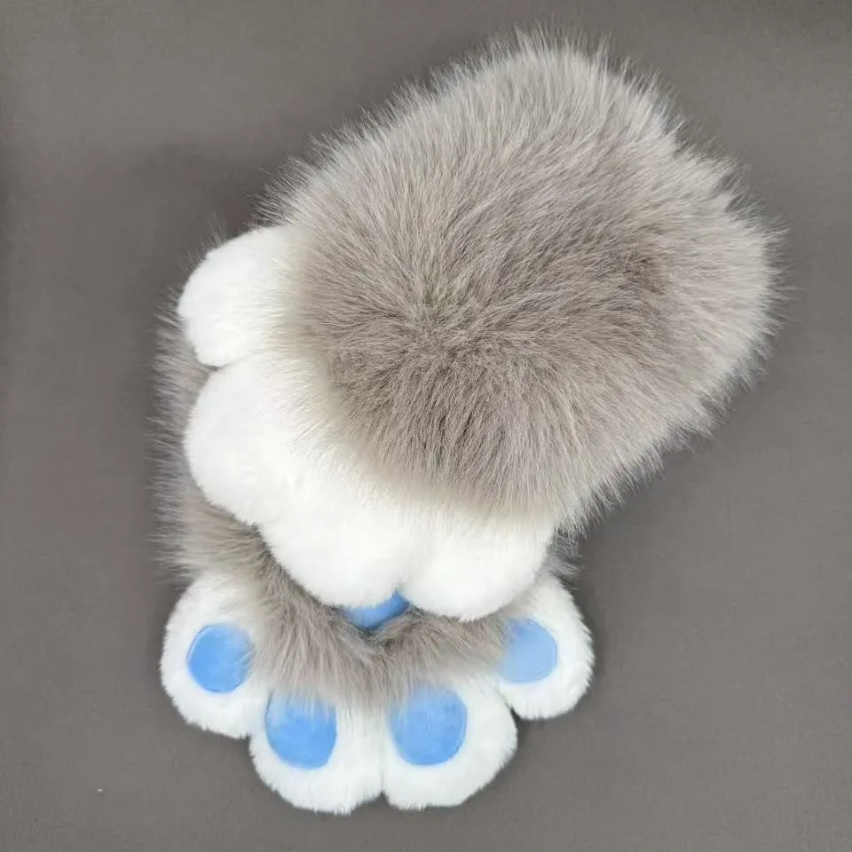 A pair of colourful animal claw cosplay gloves in nylon material on a neutral background.