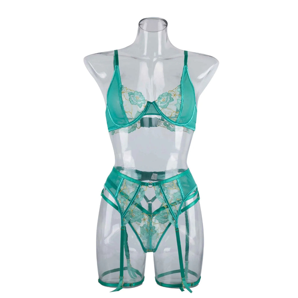 Light green women's bra set with embroidery detailing and matching bikini bottoms.
